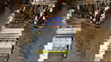 arrimador de comida robot de alimentación delaval optiduo