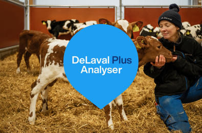 Girl cuddeling with calf - DeLaval Plus Analyser