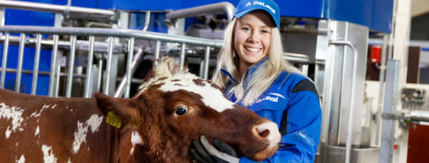 Female farmer with a cow at a VMS